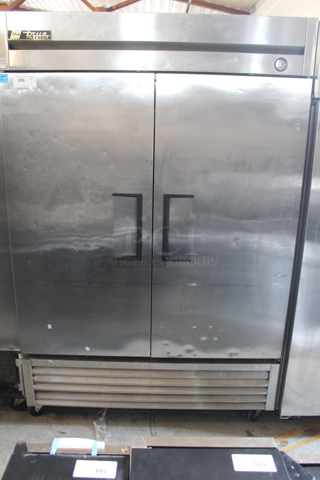 2013 True T-49F ENERGY STAR Stainless Steel Commercial Two Door Reach In Freezer w/ Poly Coated Racks on Commercial Casters. 115 Volts, 1 Phase. Tested and Working!