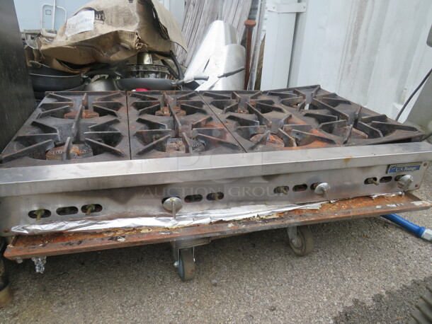 One US Range Tabletop 8 Burner Natural Gas Range. 48X28X14 - Image 1 of 1