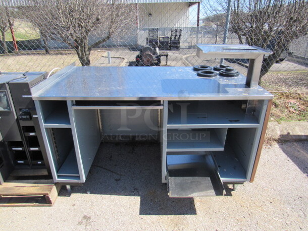 One Duke Stainless Steel Table With Under Storage And 4 San Jamar 5.5 Inch Spring Loaded Cup Dispensers. 61X34.5X44.5