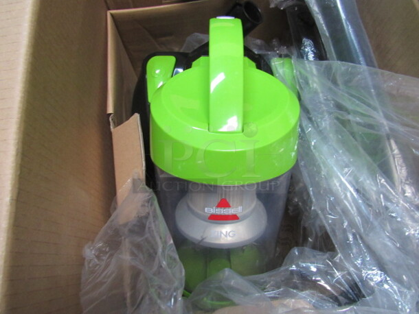 One Bissell Zing Bagless Canister Vacuum.