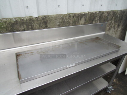 One Stainless Steel Shelf. 36X12