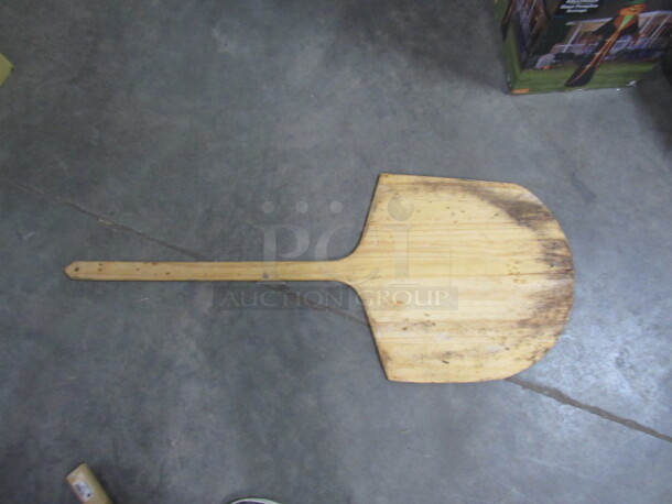 One Wooden Pizza Paddle.