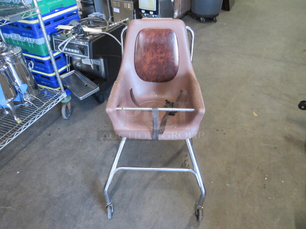 One Metal Poly High Chair With Safety Strap On Casters. 