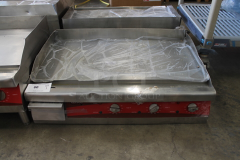 BRAND NEW SCRATCH AND DENT! Avantco 177EG30N Stainless Steel Commercial Countertop Electric Powered Flat Top Griddle w/ Thermostatic Controls. 208/240 Volts, 1 Phase.