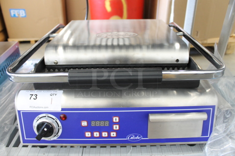 BRAND NEW SCRATCH AND DENT! Globe GPG14D Stainless Steel Commercial Countertop Electric Powered Panini Press. 120 Volts, 1 Phase. Tested and Working!