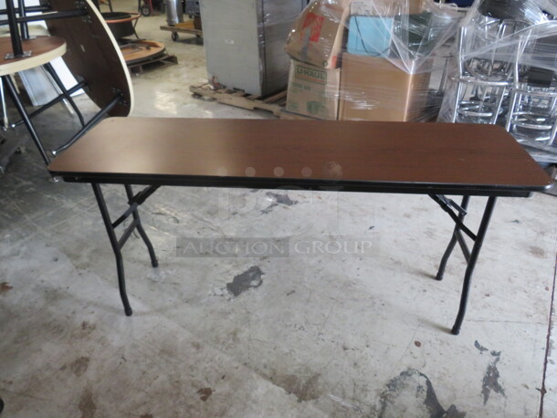 One Norwood Folding Table With Laminate Top And Metal Legs. 60X18X29 - Image 1 of 1