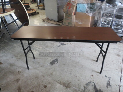 One Norwood Folding Table With Laminate Top And Metal Legs. 60X18X29