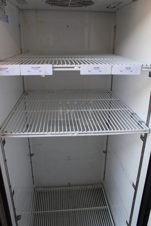 2015 True TG1R-1S ENERGY STAR Stainless Steel Commercial Single Door Reach In Cooler w/ Poly Coated Racks on Commercial Casters. 115 Volts, 1 Phase. Tested and Working! - Image 2 of 3