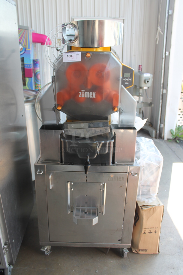 2017 Zumex Speed Pro Tank Podium Stainless Steel Commercial Floor Style Citrus Juicer on Commercial Casters. Comes w/ Extra Pieces: See Pictures For Details! 115 Volts, 1 Phase. Powers On But Parts Do Not Move - Image 1 of 11