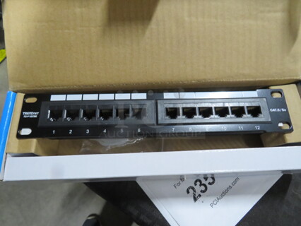 One NEW 12 Port Patch Panel. #TC-P12C5E.