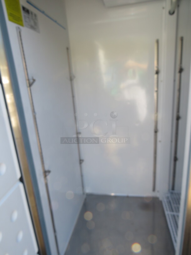One Artic Air 2 Door Freezer With 4 Racks On Casters. Model# AF49X.  53.5X33X83. $3545.00. - Image 3 of 4