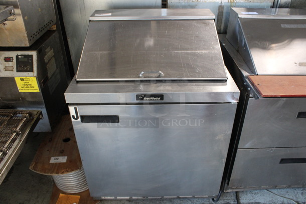 Delfield Model 4432N-12M Stainless Steel Commercial Sandwich Salad Prep Table Bain Marie Mega Top on Commercial Casters. 115 Volts, 1 Phase. 32x31.5x45. Tested and Powers On But Does Not Get Cold