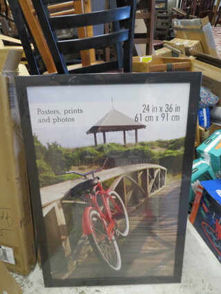 One NEW 24X36 Poster Frame.