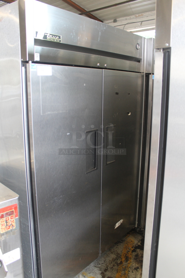 2012 True TG2R-2S Stainless Steel Commercial 2 Door Reach In Cooler w/ Poly Coated Racks on Commercial Casters. 115 Volts, 1 Phase. Tested and Working! - Image 1 of 6