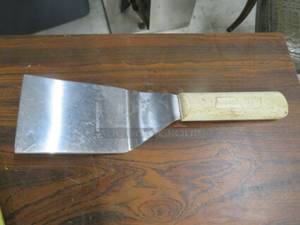 One Dexter Hamburger Turner.