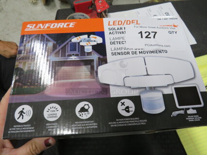 One NEW LED Sunforce Solar Motion Activated Lamp.