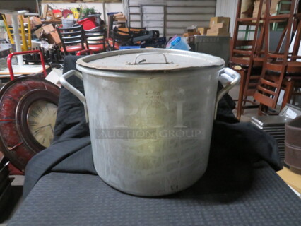 One Aluminum Stock Pot With Lid.