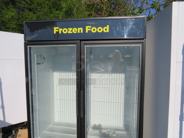 One True 2 Door Glass  Display Freezer With 8 Racks. Model# GDM-49F-LD. 54X30X79. $8004.16. - Image 1 of 3
