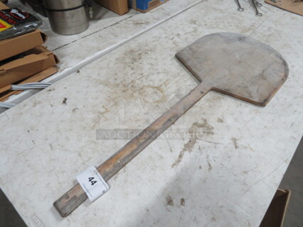 One Wooden Pizza Paddle.