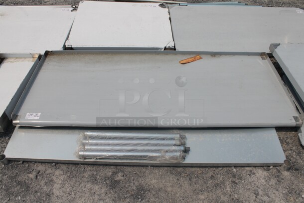 BRAND NEW SCRATCH AND DENT! Commercial Stainless Steel Disassembled Equipment Stand With Undershelf And Legs. - Image 1 of 4