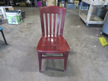 Solid Wooden Chair In A Dark Finish. 4XBID