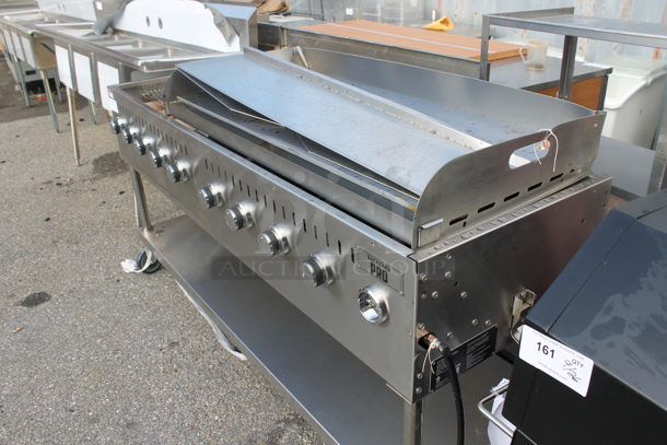 BRAND NEW SCRATCH AND DENT! 2022 Backyard Pro LPG72 Stainless Steel Commercial Propane Gas Powered Portable Catering Grill w/ Under Shelf on Commercial Casters.  - Image 4 of 5