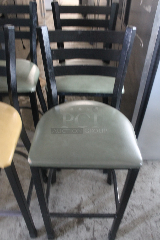 4 Black Metal Bar Height Chairs w/ 1 Yellow and 3 Green Seat Cushions. 4 Times Your Bid! - Image 3 of 6