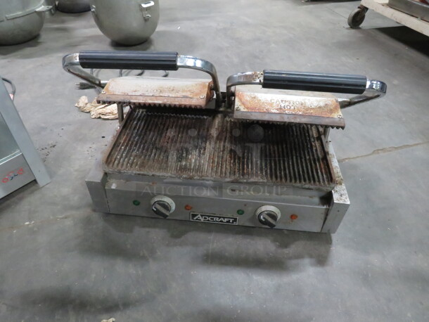 One Adcraft Double Panini Press. Model# SG-813B. 120 Volt. 1750 Watt. 22X12X8. $774.99 - Image 1 of 3