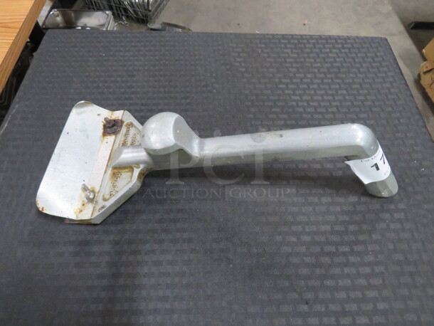One Griddle Scraper. - Image 1 of 1