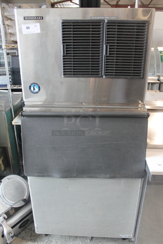 Hoshizaki KML-350MAH Stainless Steel Commercial Ice Machine Head on Commercial Ice Bin. 115-120 Volts, 1 Phase.