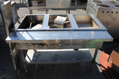 Eagle AWT3-NG Stainless Steel Commercial Natural Gas Powered 3 Bay Steam Table w/ Under Shelf. 
