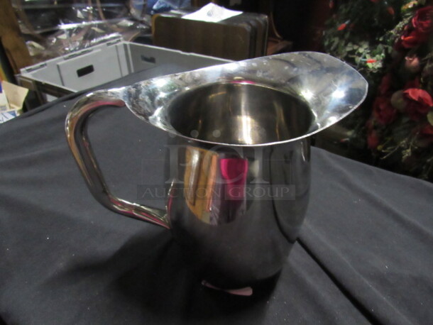 One Stainless Water Pitcher.