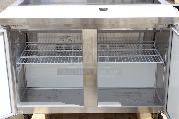 BRAND NEW SCRATCH & DENT! Avantco APT-48-HC 48" 2 Door Refrigerated Sandwich Prep Table, 115v. Tested Turns On. Throws Error Code. 
 - Image 9 of 9