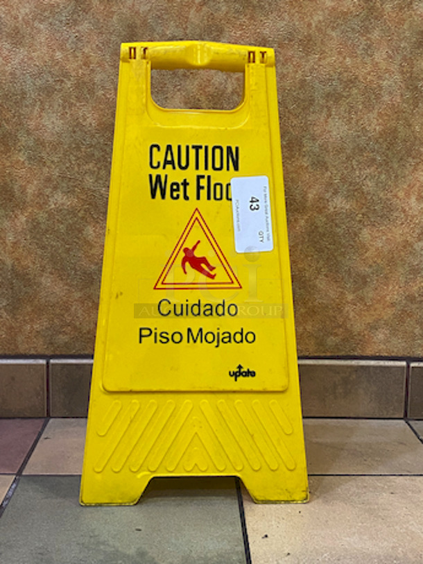 Update International WFS-25 Caution Wet Floor Sign, Yellow, 24".

Fold-out style
Polypropylene construction
Sign is tall and highly visible
Text in both English and Spanish
Alerts patrons where there is a wet floor - Image 1 of 3