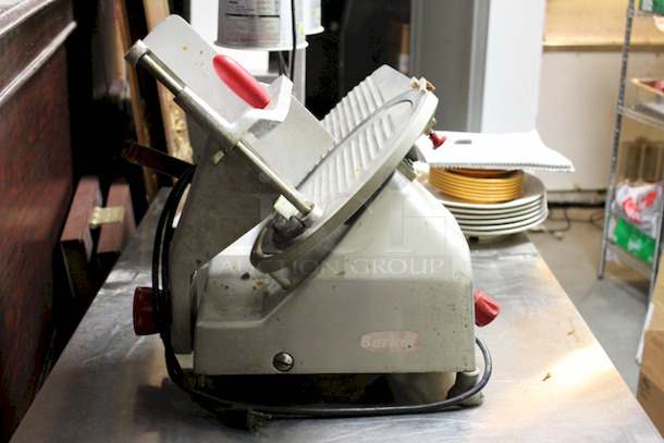 Berkel 827A 12" Manual Gravity Feed Meat Slicer - 1/2 hp, 4 Amps/60 Hz/1 Ph/115 V/460 W, 
24 Inches x 21 1/2 Inches x 21 1/4 Inches - Image 4 of 5