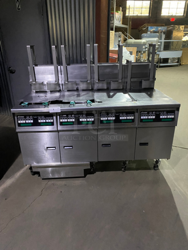 FABULOUS! Pitco Frialator Commercial Natural Gas Powered 4 Bay Deep Fat Fryer! With Automatic Hydraulic Basket Lift!  With Fryer Covers! With Oil Filter System! With 4 Frying Baskets! All Stainless Steel! On Casters! Working When Removed! Model: SG14-S SN: G05CA007837 120V 60HZ 1 Phase