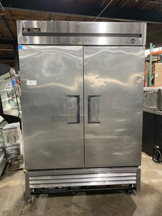 True Commercial 2 Door Reach In Refrigerator! With Poly Coated Racks! Solid Stainless Steel! On Casters! Model: T49 SN: 7140968 115V 60HZ 1 Phase