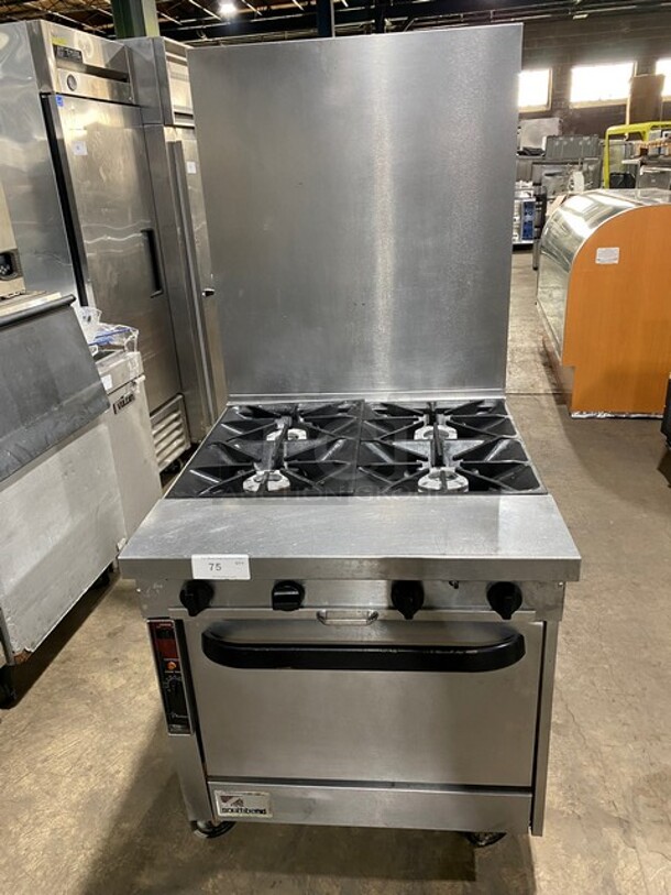 Southbend Commercial Natural Gas Powered 4 Burner Stove! With Raised Back Splash! With Oven Underneath! All Stainless Steel! On Casters! Model: P32DXX SN: 05M09249