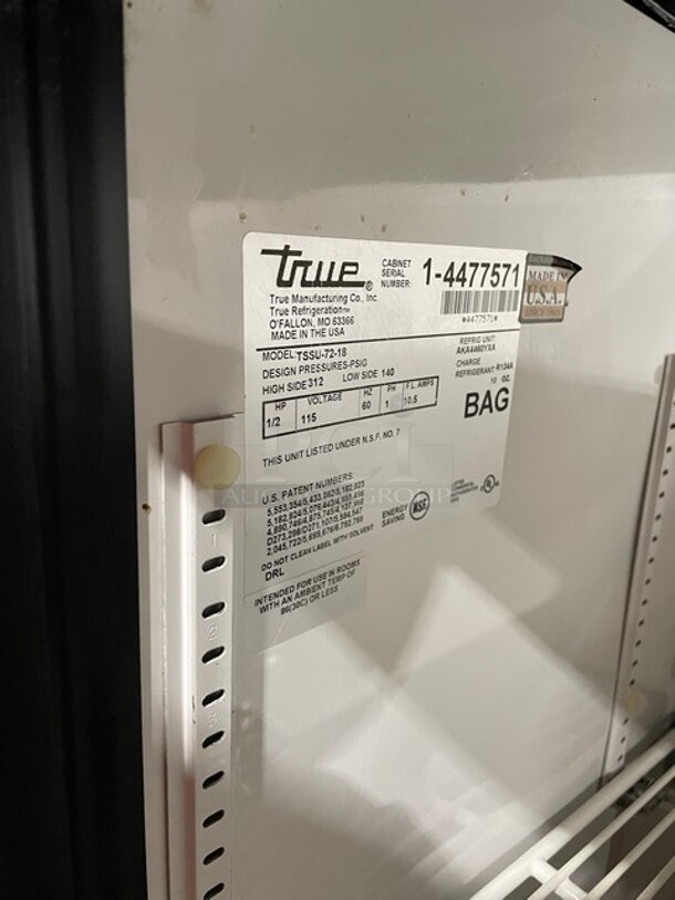 True Mega Top Sandwich/Salad Prep Table! All Stainless Steel! With 3 Door Refrigerated Storage Underneath! With poly Coated Racks! 115V 1 Phase! On Casters! Model: TSSU-72-18 SN: 1-4477571!  - Image 8 of 11