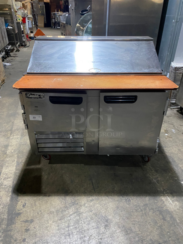 Leader Commercial Refrigerated Sandwich/Salad Prep Table! With Wooden Cutting Board! With 2 Door Storage Space Underneath! With Poly Coated Rack! All Stainless Steel! On Casters! Model: LM48 SN: GZ12M0807B 115V 60HZ 1 Phase