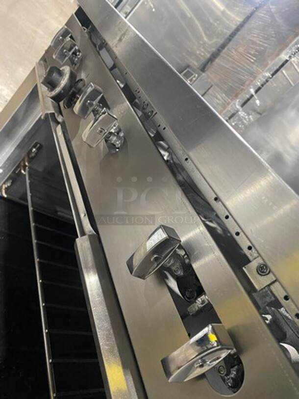 Sunfire Commercial Natural Gas Powered 6 Burner Stove! With Raised Back Splash And Salamander Shelf! With Oven Underneath! All Stainless Steel! On Casters! - Image 8 of 9
