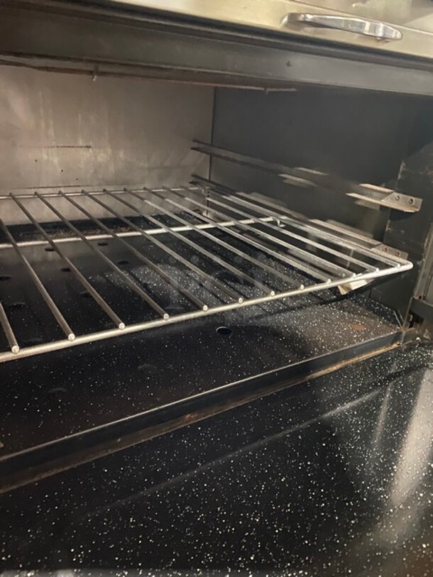 Southbend Commercial Natural Gas Powered 12 Burner Stove! With Raised Back Splash And Salamander Shelf! With 2 Full Size Oven Underneath! All Stainless Steel! On Casters! Working When Removed! - Image 8 of 10