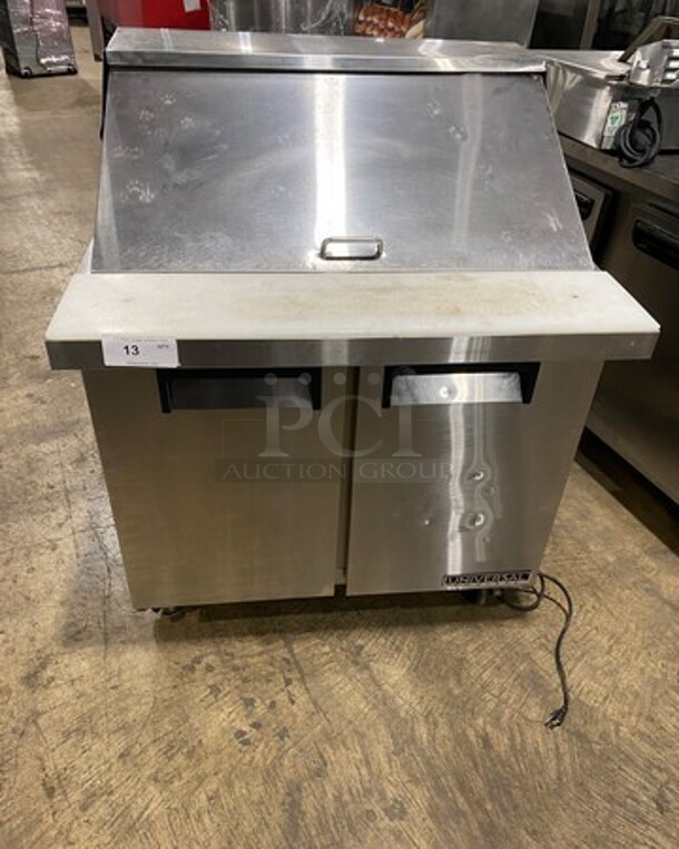 Universal Coolers Commercial Refrigerated Sandwich Prep Table! With 2 Door Storage Space Underneath! With Poly Coated Rack! All Stainless Steel! On Casters! Model: SC36BMI SN: 6733424419111105 115V