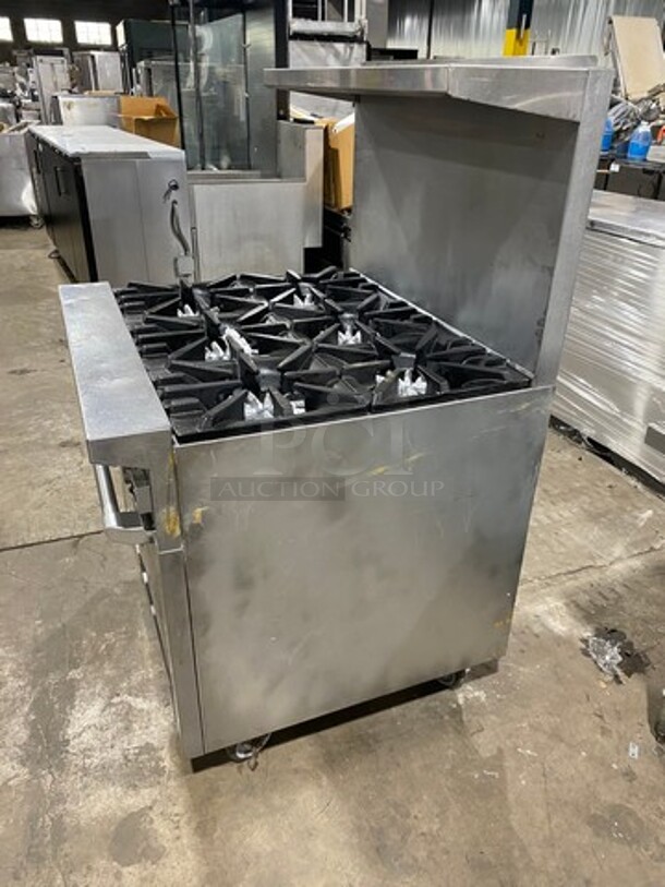 Garland Commercial Natural Gas Powered 6 Burner Stove! With Raised Back Splash And Salamander Shelf! With Oven Underneath! Metal Oven Rack! All Stainless Steel! On Casters! - Image 3 of 10