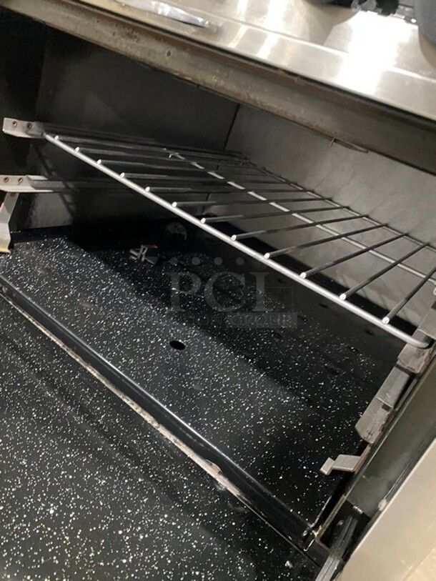 Southbend Commercial Natural Gas Powered 12 Burner Stove! With Raised Back Splash And Salamander Shelf! With 2 Full Size Oven Underneath! All Stainless Steel! On Casters! Working When Removed! - Image 8 of 10