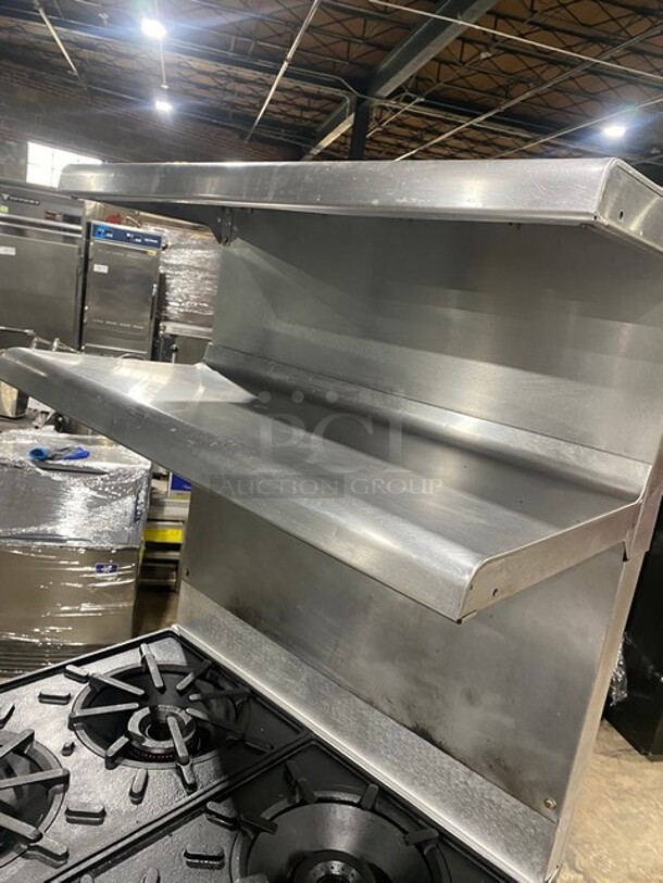 Vulcan Commercial Natural Gas Powered 4 Burner Stove! With Raised Back Splash Double shelf! With Oven Underneath! All Stainless Steel! On Casters! Model: GH45 SN: 4813044120 - Image 9 of 11