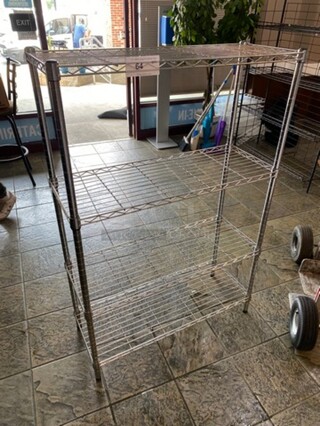 Commercial Metal 4 Tier Shelf! On Legs! BUYER MUST DISMANTLE! PCI CANNOT DISMANTLE FOR SHIPPING! PLEASE CONSIDER FREIGHT CHARGES!