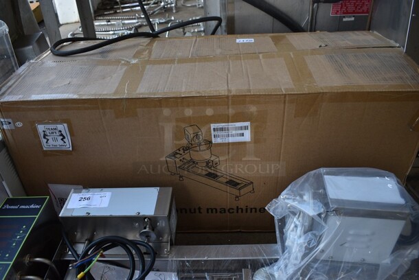 BRAND NEW IN BOX! Model T-101 Stainless Steel Commercial Countertop Electric Powered Automatic Donut Making Machine. 110 Volts. Stock Picture Used As Gallery. 39x19x24. - Image 9 of 11