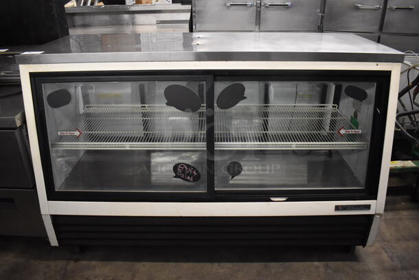 True TSID-72-4L Stainless Steel Commercial Deli Display Case Merchandiser on Commercial Casters. 115 Volts, 1 Phase. 72.5x32x46.5. Tested and Working!