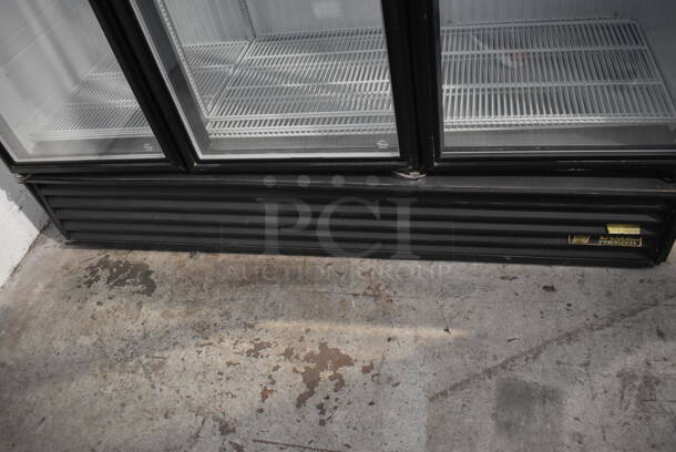 2014 True GDM-72F-LD Commercial Free Standing Electric Powered Triple Swing Glass Door Merchandiser Freezer In Black With Polycoated Racks. 115V/1 Phase Could Not Test Due To Different Plug Style - Image 3 of 8